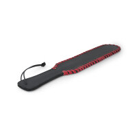 Playful BDSM paddle made of leather, with loop, contrasting red stitching